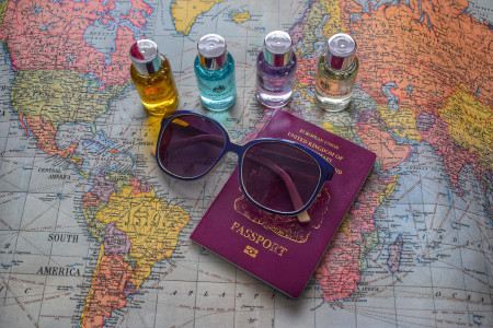 Travel kit against world map